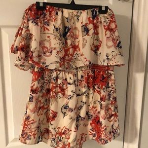 Off shoulder one piece outfit.